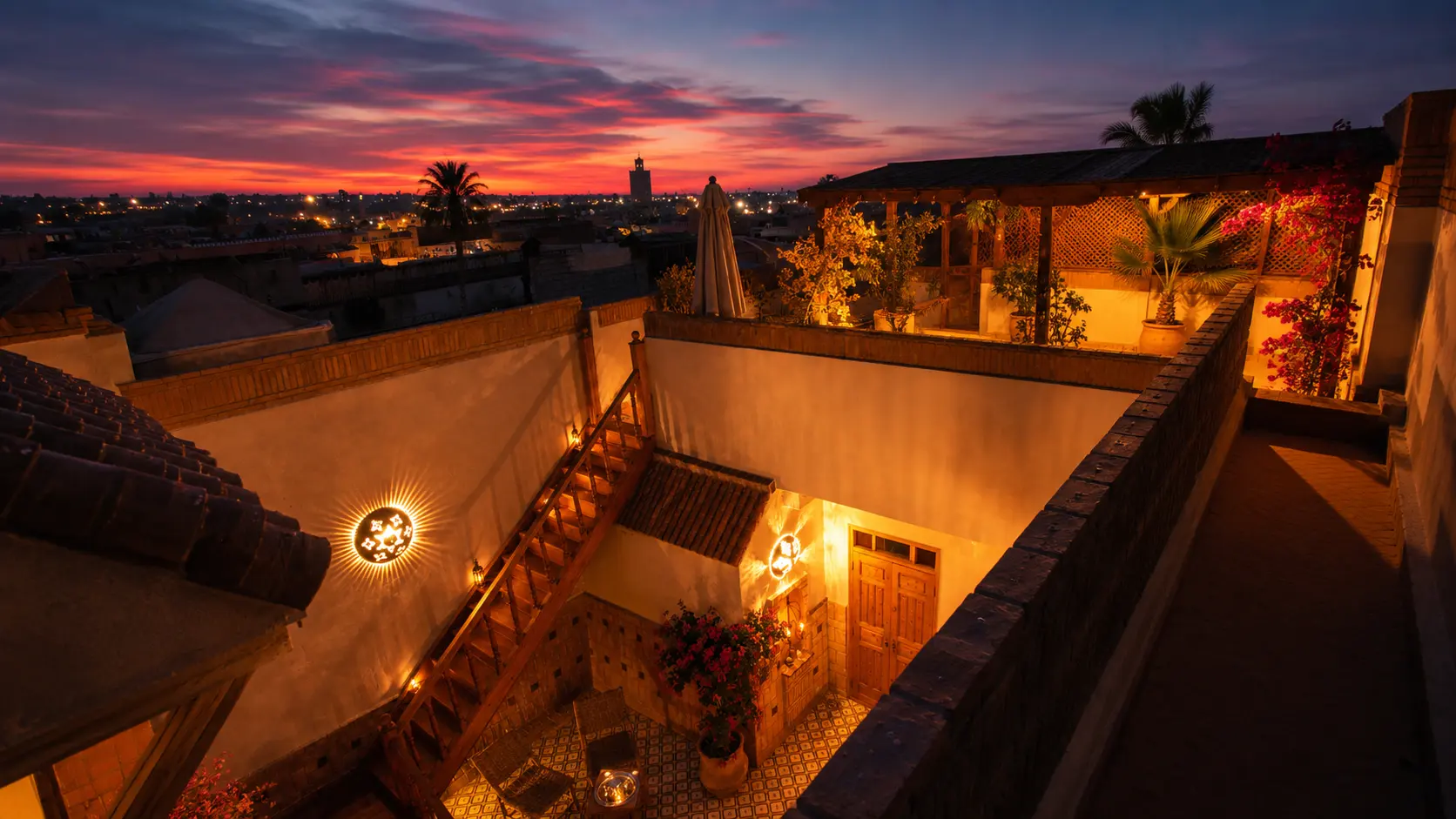 Sunset over the Kasbah rooftops and minarets from the riad terrace
